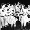 The Rockford Peaches are league champions for the third year in a row in the All-American Girls Professional Baseball League. 