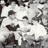 New York Yankee star Joe DiMaggio with young fans in Richmond, VA.