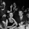 Randolph Scott and his wife at a Hollywood club in 1950.